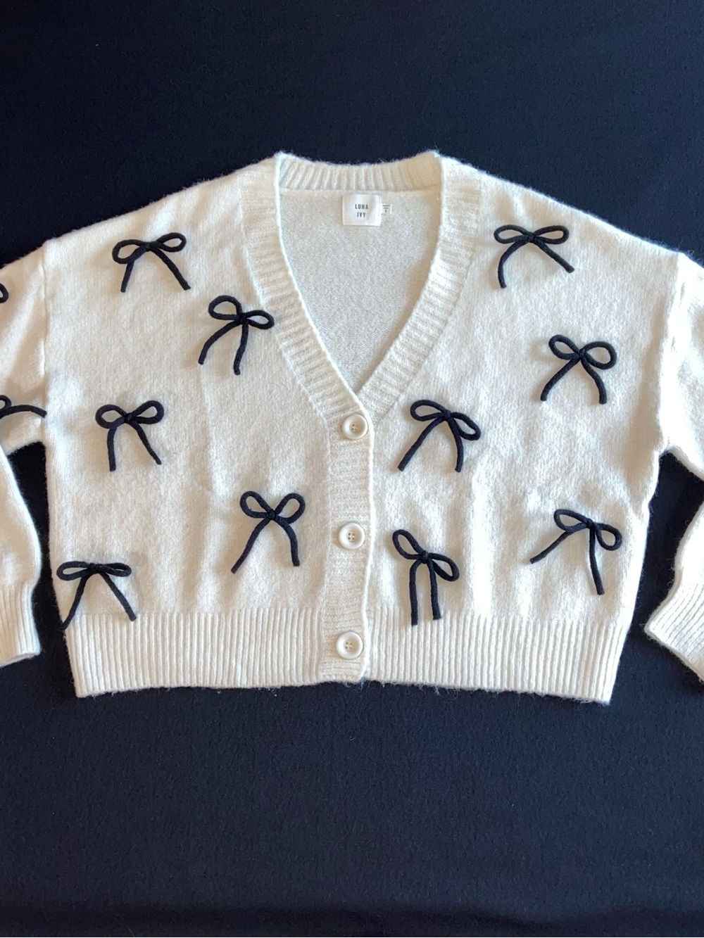 Luna Ivy - White buttoned Sweater with Black Bows Appliqué Size Med